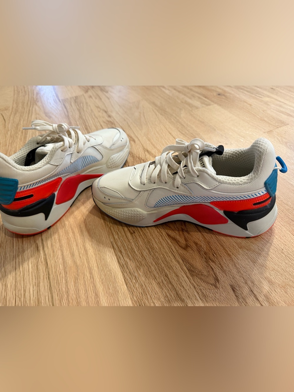 Puma Cream Sneakers with Red and Blue Accents